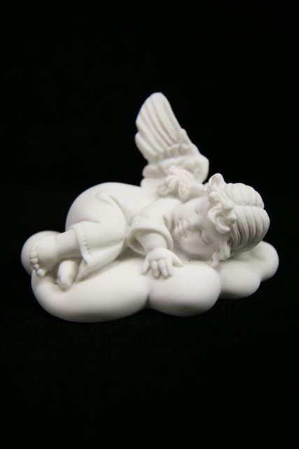 Little Angel Sleeping on Clouds.